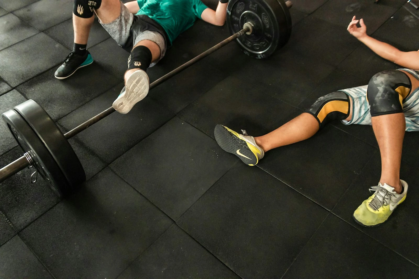 Personal trainer working with a client in the gym
