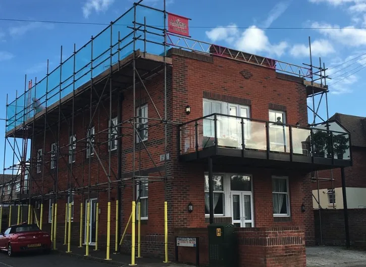 Full perimeter scaffolding on a two-storey commercial building in West Sussex by A-Star Scaffolding Southern Ltd
