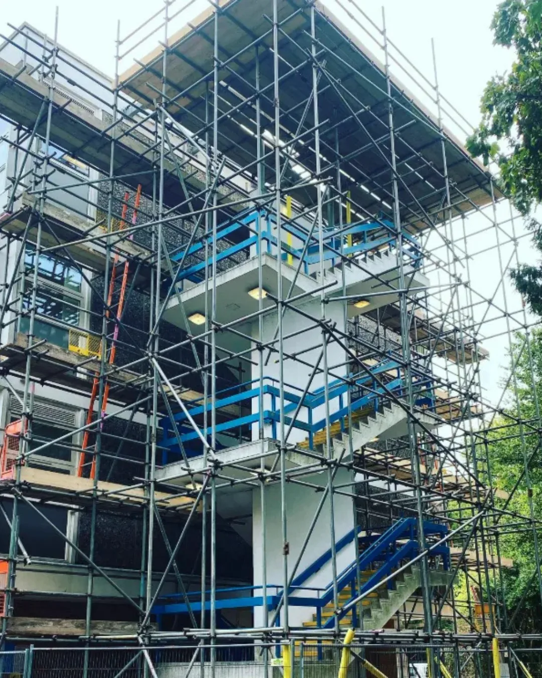 Large-scale commercial scaffolding on a multi-storey building by A-Star Scaffolding Southern Ltd, West Sussex
